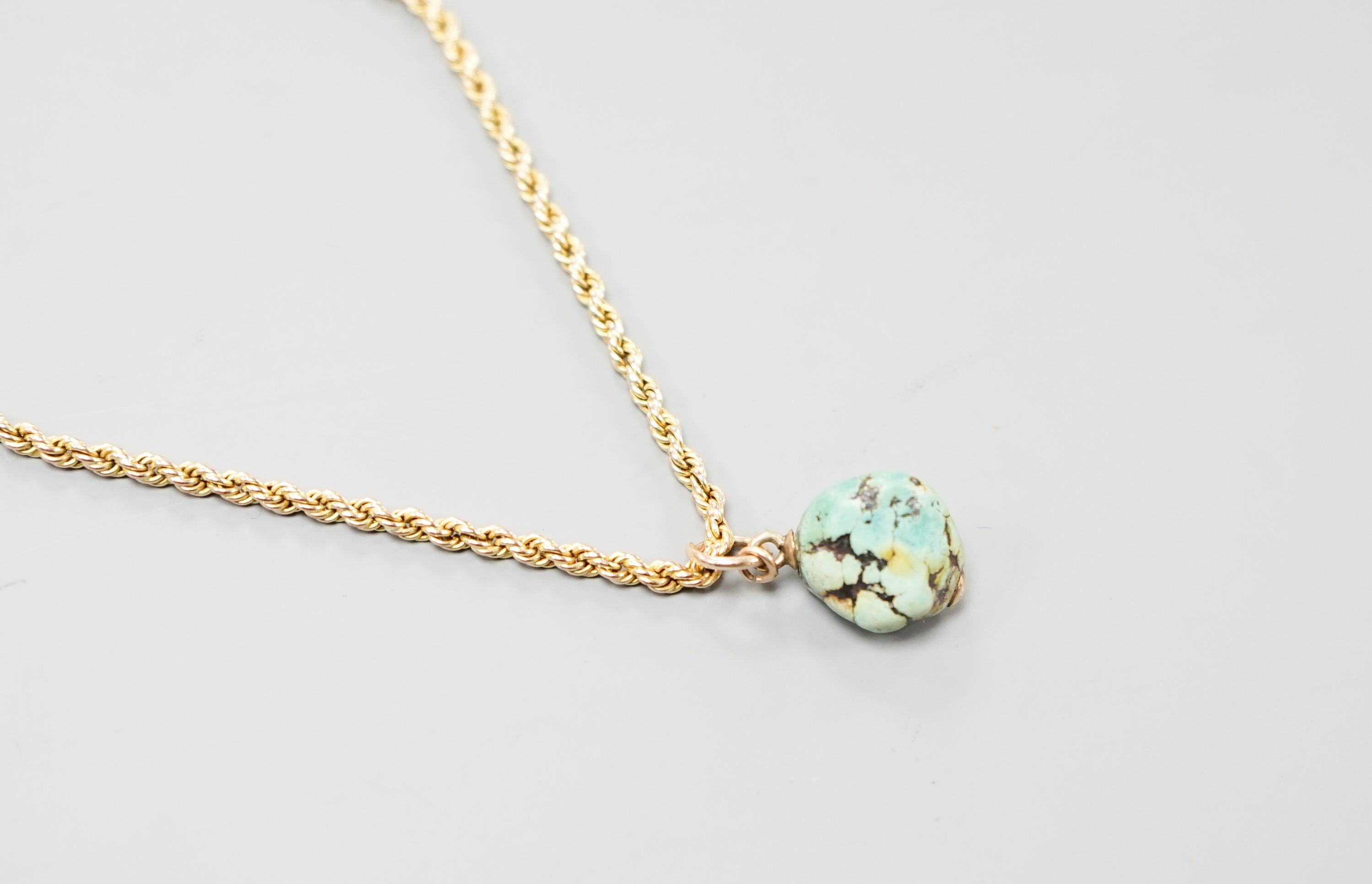A 9ct rope twist guard chain, with turquoise pebble pendant, chain length, 146cm